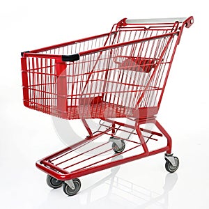Red shopping cart isolated on white background photo