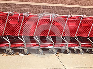 Red Shopping Carts Lined Up
