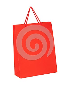 Red shopping paper bag isolated on white