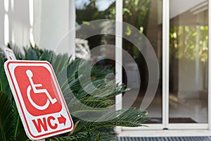 Red sign of toilet for wheelchair users