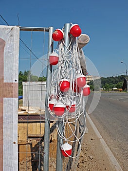 Red signal lights with a long wire