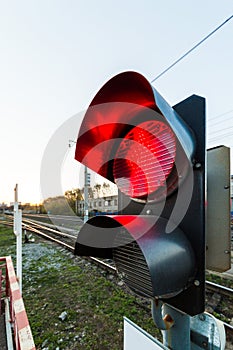 Red signal of simophore near the railway tracks