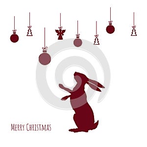 Red silhouette of hare with christmas balls on white background. Xmas card. New year postcard