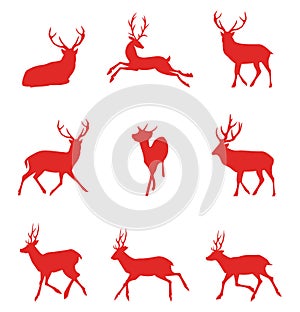 Red silhouettes of deer. Vector illustration.
