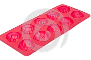 Red silicone mold for ice.