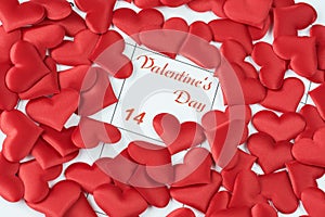 Red silk hearts on the calendar