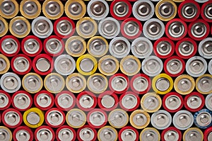 red and silver aa alkaline batteries stack on full frame