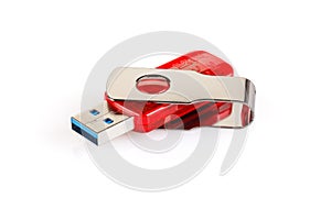 Red and silver USB 3.0 flash drive isolated on white background . USB Pen Drive or flash drive on white background. Close-up. Full