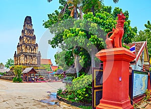 The red Singha Lion and Suwan Chedi Jungkote of Wat Chammathewi, Lamphun, Thailand