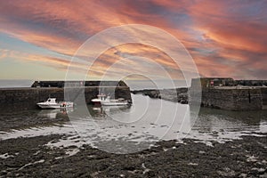 Red Skies at  Johnshaven Harbour Aberdeenshire, Scotland UK