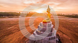 Red sky over buddha statues