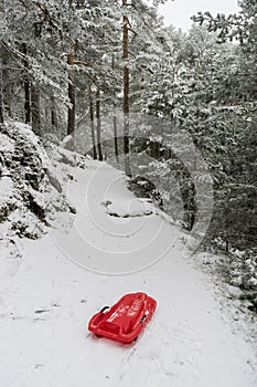 red sled, Port of Navacerrada in Madrid, Spain. photo