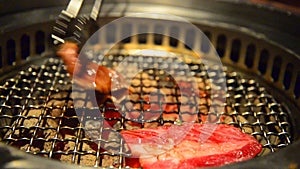 Red slide raw beef grill with stove charcoal