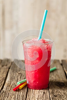 Red Slushie Drink in Plastic Cup with Straws