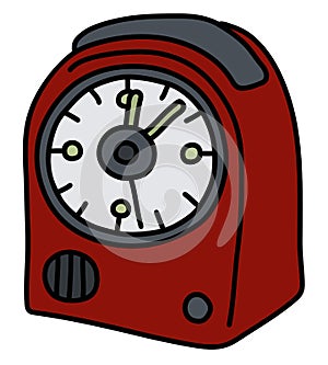 The red small alarm clock