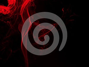 Red smoke abstract on black background. fire design, darkness concept