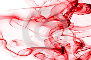 Red smoke abstract on white background, movement of red ink color