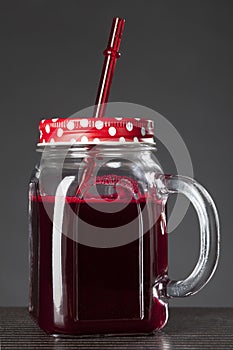 Red smoothie juice in jar