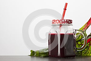 Red smoothie juice in jar