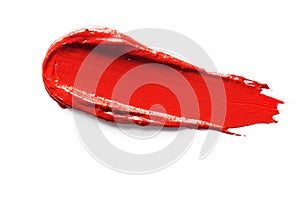 Red smudged lipstick isolated on white background.