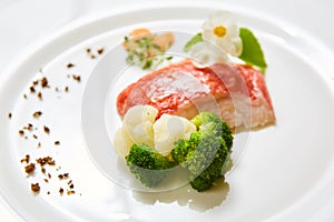 The red snapper with vegetable. Shallow dof.