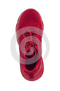 Red sneaker made of fabric on a white background