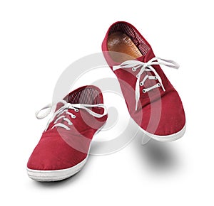 Red sneakers dancing isolated