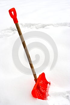 Red snow shovel