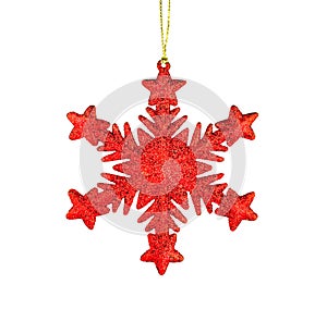 Red snowflake isolated on white background. Shiny Christmas tree toy