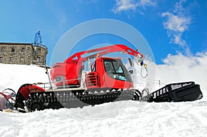 Red snowgroomer
