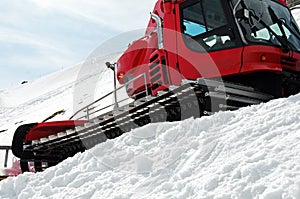 Red snowgroomer