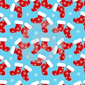 Red sock with white snowflake illustration seamless pattern on blue