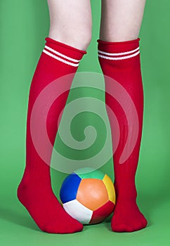 Red socks long legs and football