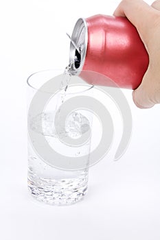 Red soda can and glass