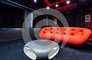 Red sofa at home cinema