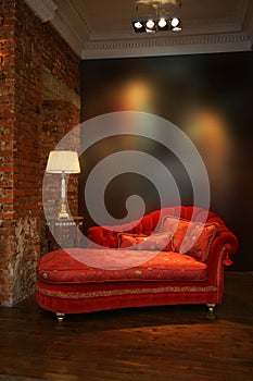 Red sofa and lamp