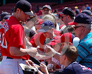 Red Sox pitcher Cla Meredith signs autographs