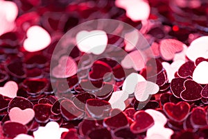 Red sparkle heart background. bright and festive. St. Valentine`s concept of greeting. Macro photo