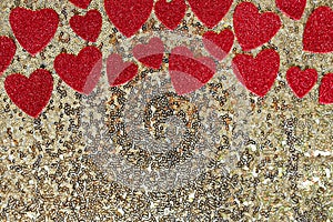 Red Sparkly Heart Confetti Framing Gold Sequin Background