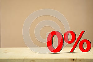 Red 0 % for special Offer or zero percent on wooden background with copy space