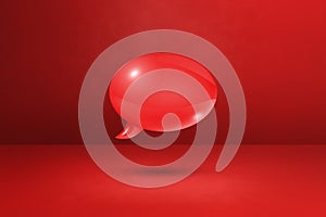 Red speech bubble on concrete wall background