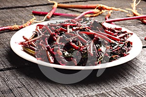 Red spinach stir fry from Asian cuisine.