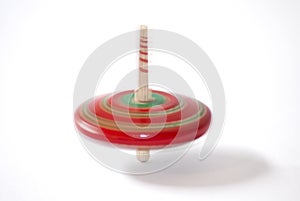 A red spinning top