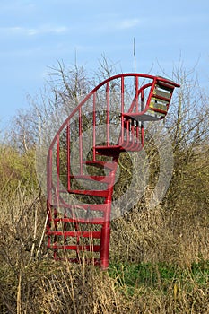 Red spiral staircase also known as watchtower or lookout seat