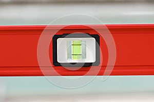 Red spirit level for architectural and construction works
