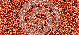 Red sponge. 3D structure, background, texture