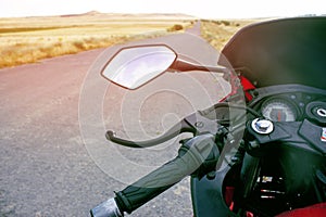 Red sport bike stands on the track