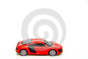 red sport car toy on white