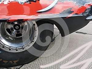 red sport car wheel drifting
