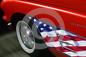 Red sports car with American flag trim